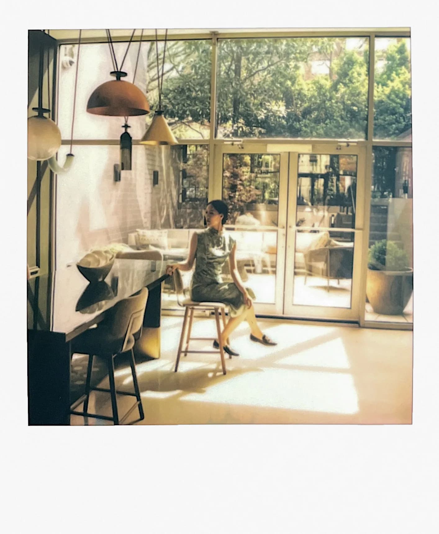 A cream-toned instant cafe photograph.